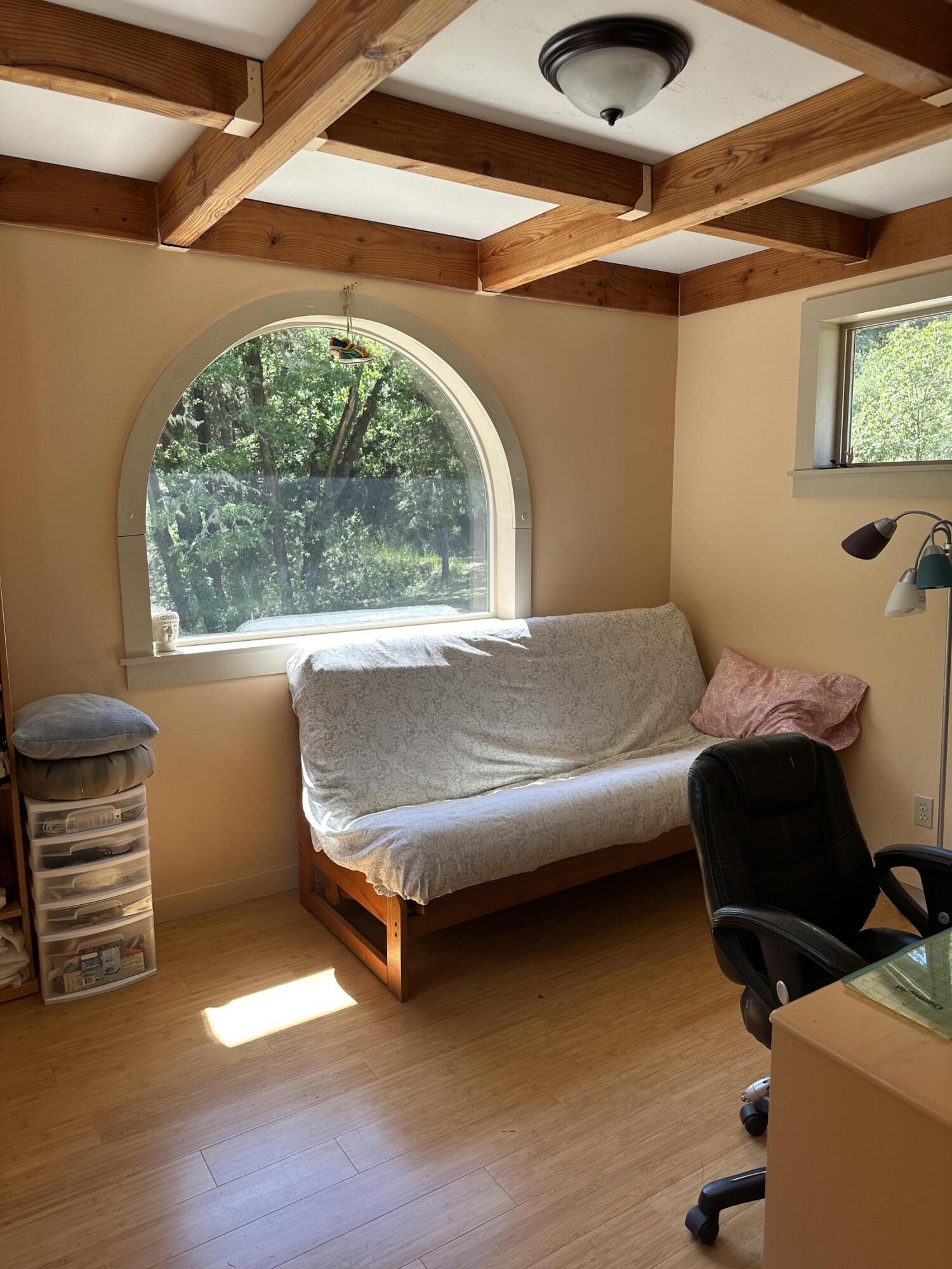 83000 Milstead Road Garberville, CA 95542 - Photo 24 of 67 a bedroom with a bed and a window