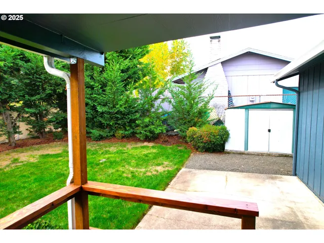 a view of a porch with a yard