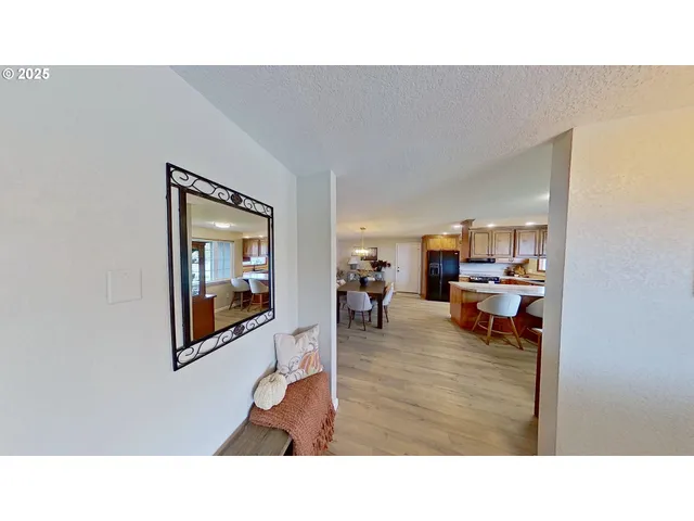 a room with furniture and a mirror