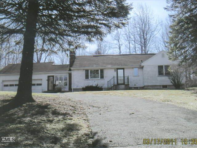 6 Old Danbury Road Ridgefield, CT 06877 - Photo 1 of 1 a front view of a house with a yard
