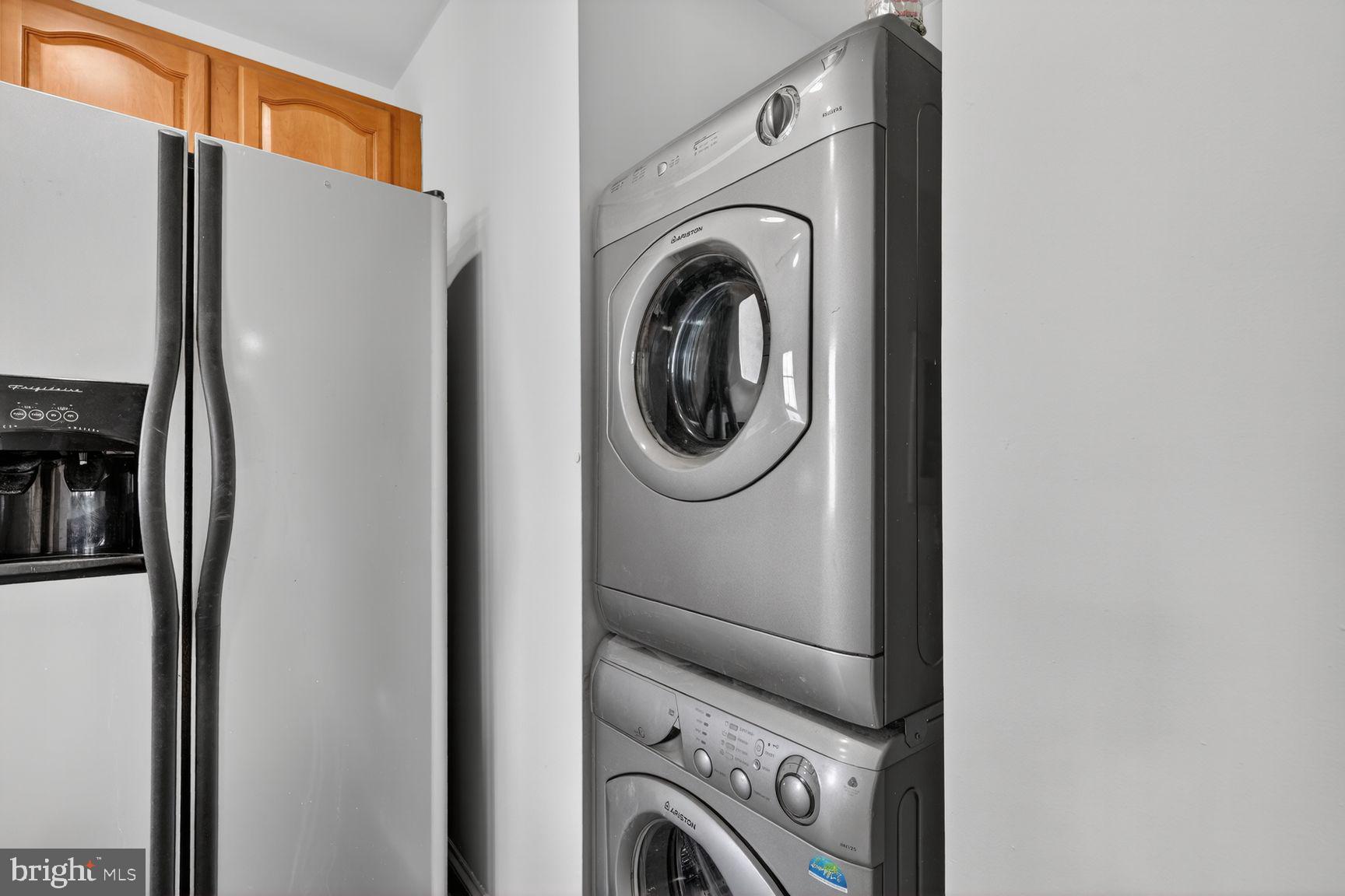 3868 9th Street Southeast, Unit 301 Washington, DC 20032 - Photo 15 of 16 a utility room with dryer and washer
