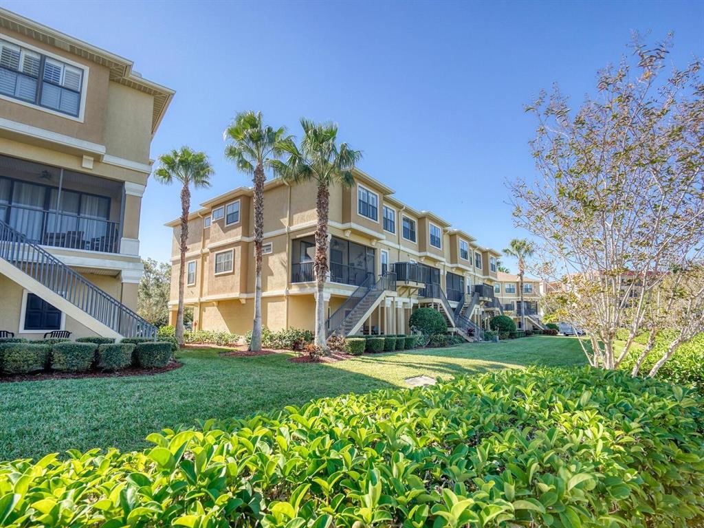 592 Bella Loop Dunedin, FL 34698 - Photo 25 of 25 a view of a house with a yard