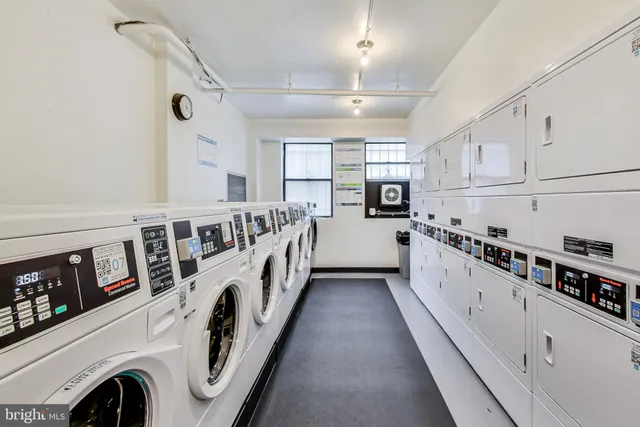 a kitchen with stainless steel appliances sink and cabinets