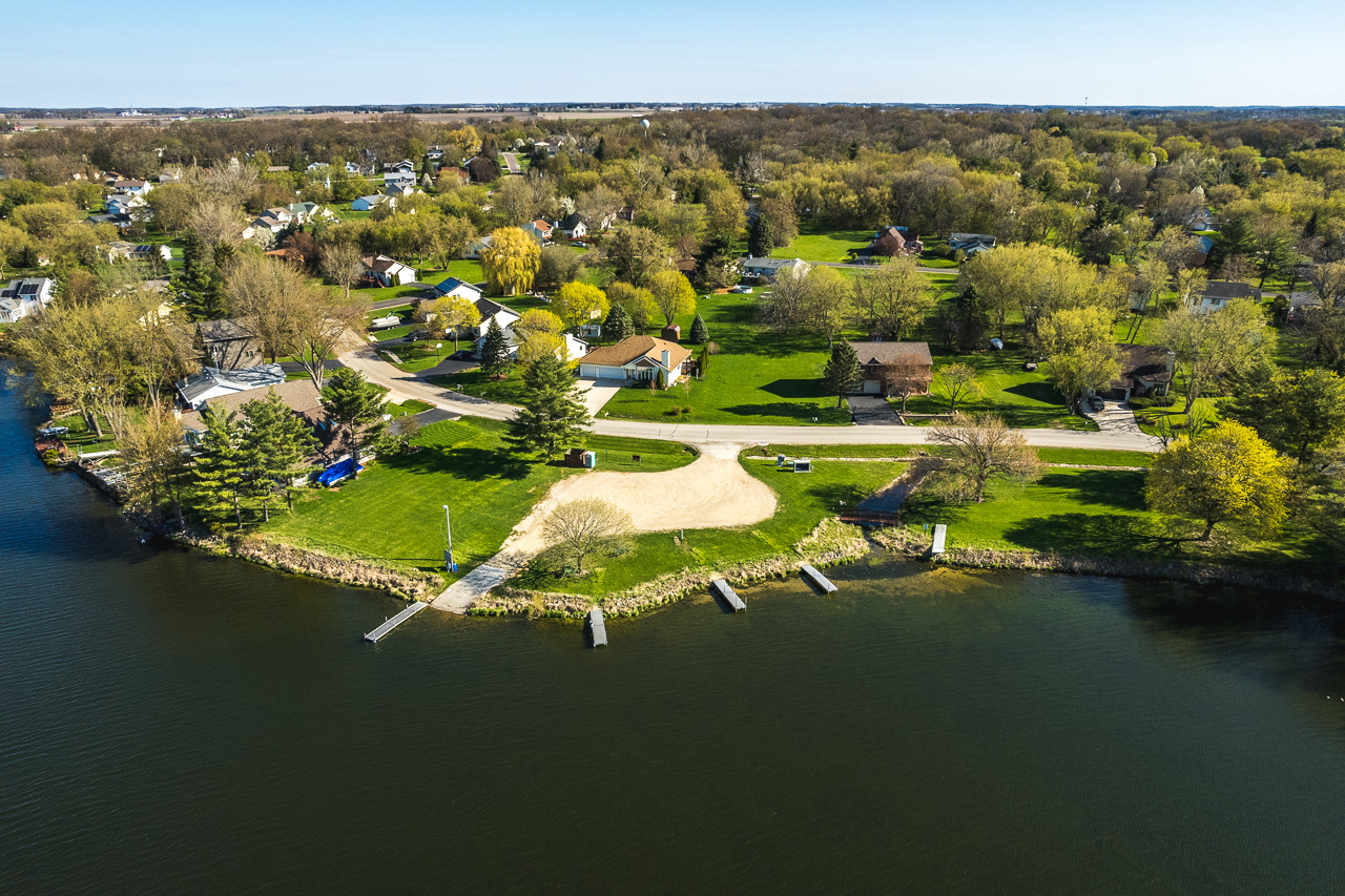 139 Pembroke Road Southwest Poplar Grove, IL 61065 - Photo 11 of 23 a view of a lake with an outdoor space
