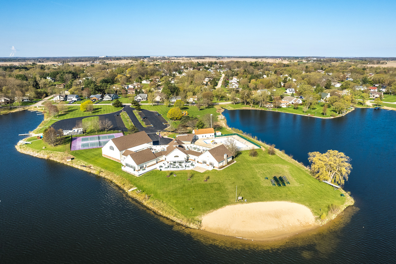 139 Pembroke Road Southwest Poplar Grove, IL 61065 - Photo 13 of 23 a view of a swimming pool with an ocean view