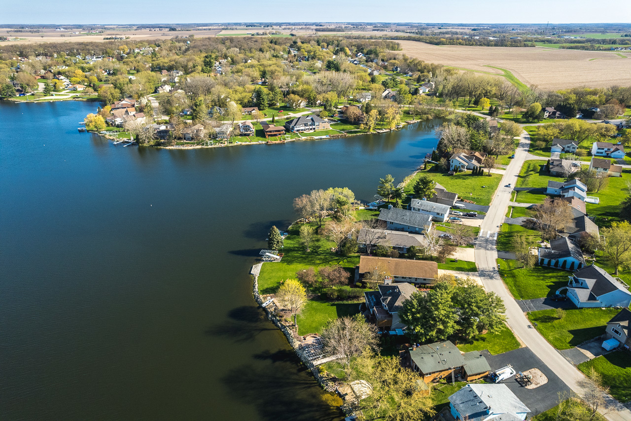 139 Pembroke Road Southwest Poplar Grove, IL 61065 - Photo 14 of 23 a view of a lake with a mountain view