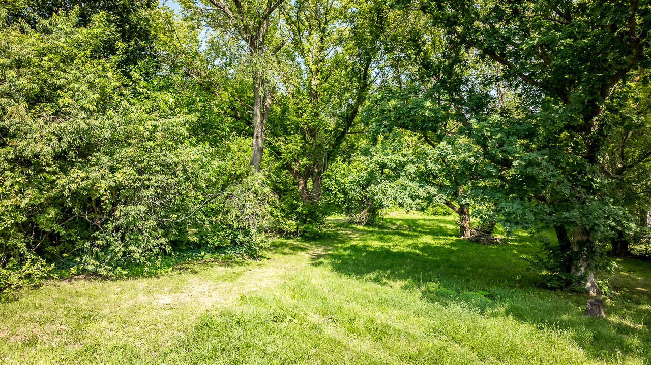 139 Pembroke Road Southwest Poplar Grove, IL 61065 - Photo 2 of 23 a yard with a tree