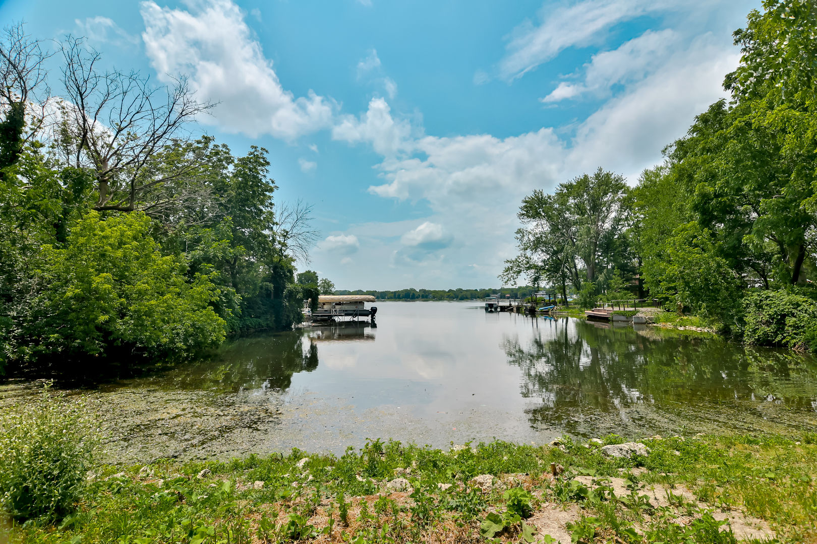 139 Pembroke Road Southwest Poplar Grove, IL 61065 - Photo 21 of 23 a view of a lake from a yard