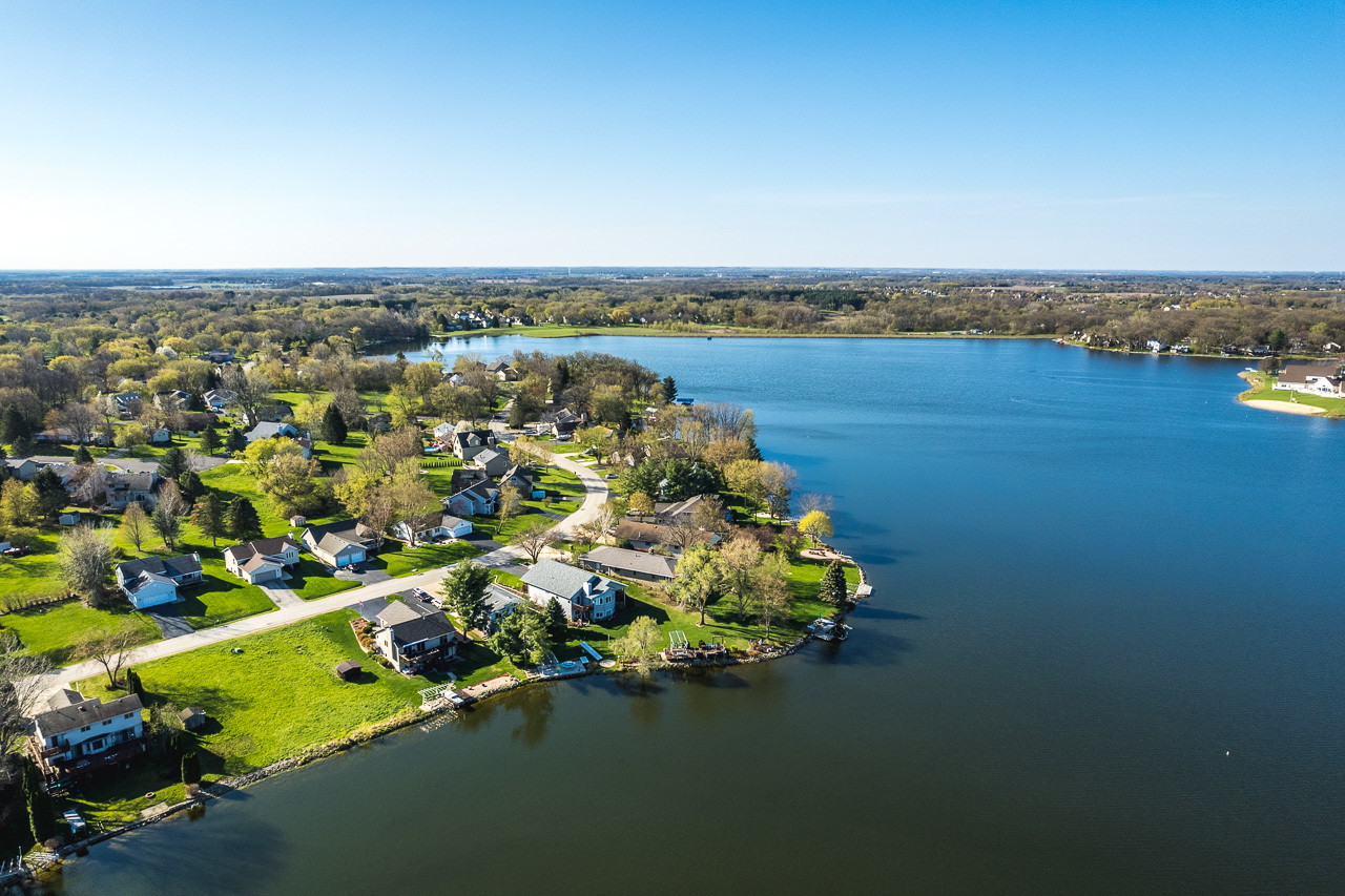 139 Pembroke Road Southwest Poplar Grove, IL 61065 - Photo 10 of 23 an aerial view of a house with a lake view