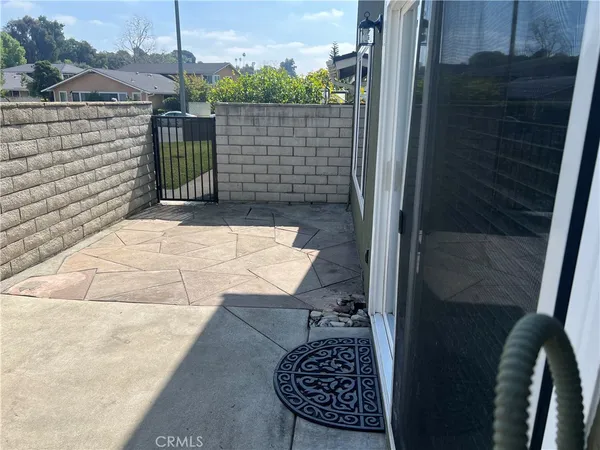 a balcony with a rug