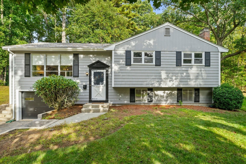 12 Tall Tree Road Sharon, MA 02067 - Photo 1 of 26 a front view of a house with a yard