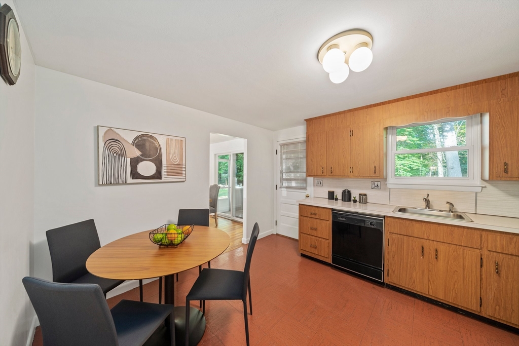 12 Tall Tree Road Sharon, MA 02067 - Photo 7 of 26 a view of a dining room with furniture and window