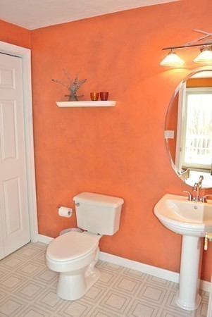 10 Osgood Road Sterling, MA 01564 - Photo 12 of 30 a white toilet sitting next to a bathroom sink