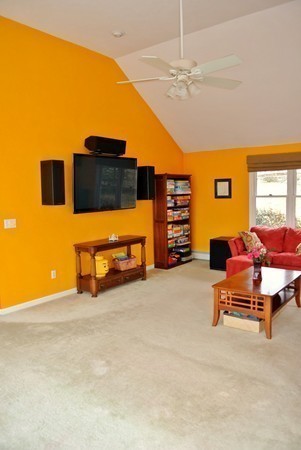 10 Osgood Road Sterling, MA 01564 - Photo 14 of 30 a living room with furniture and a flat screen tv