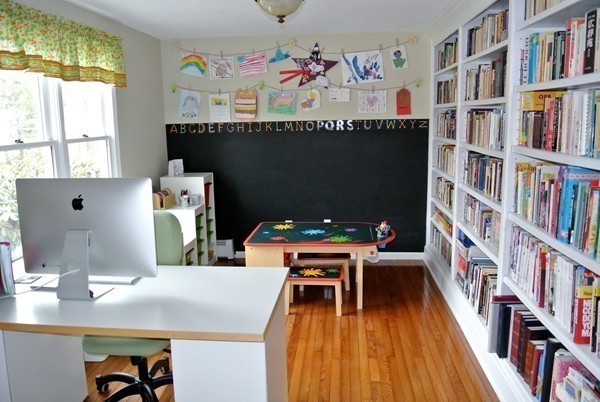 10 Osgood Road Sterling, MA 01564 - Photo 16 of 30 a dining room with a table and a book shelf