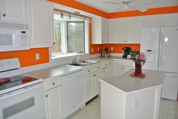 10 Osgood Road Sterling, MA 01564 - Photo 5 of 30 a kitchen with stainless steel appliances granite countertop a sink and a cabinets