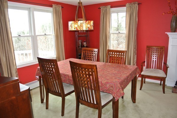10 Osgood Road Sterling, MA 01564 - Photo 9 of 30 a dining room with furniture a chandelier and window