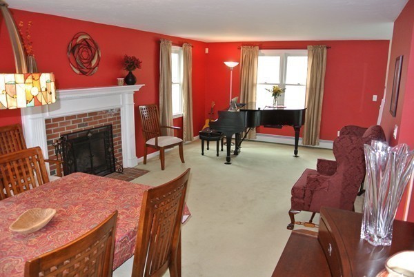 10 Osgood Road Sterling, MA 01564 - Photo 10 of 30 a view of a livingroom with furniture and a fireplace