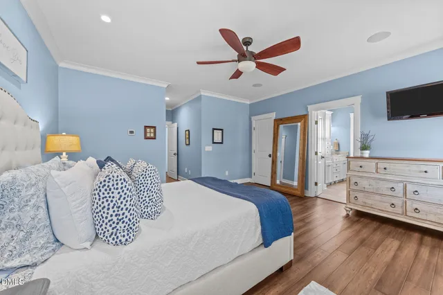 a bedroom with furniture and a bed