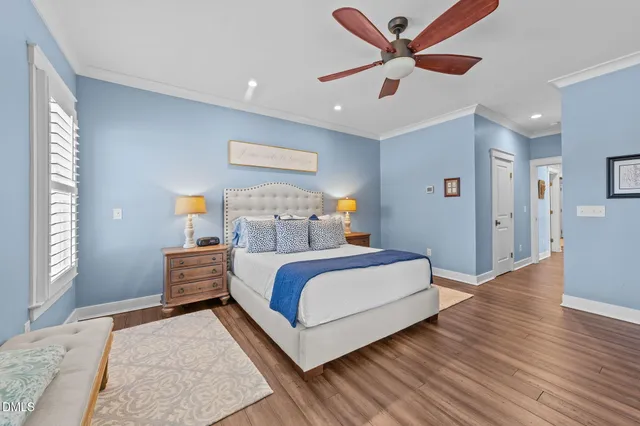 a bed room with a bed and a window