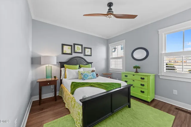a view of a room with gym equipment and a large window