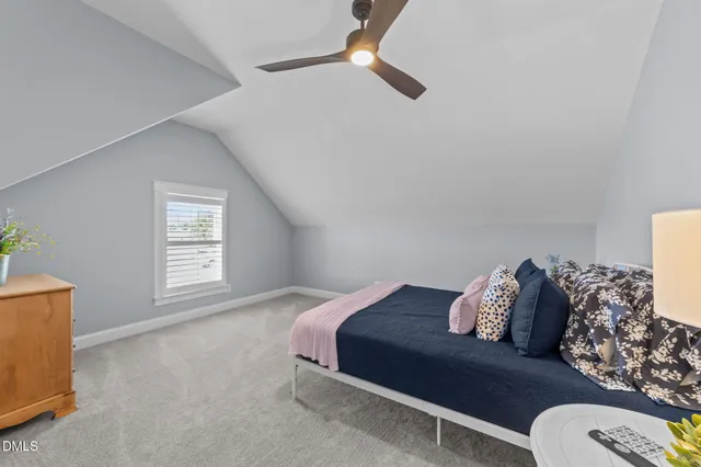 a kitchen with granite countertop stainless steel appliances and refrigerator