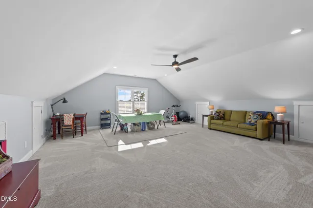 a kitchen with stainless steel appliances granite countertop a refrigerator a sink dishwasher stove and oven