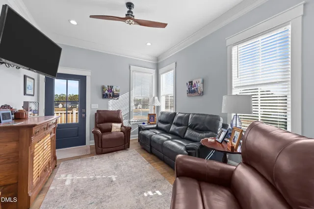 a view of a house next to a yard