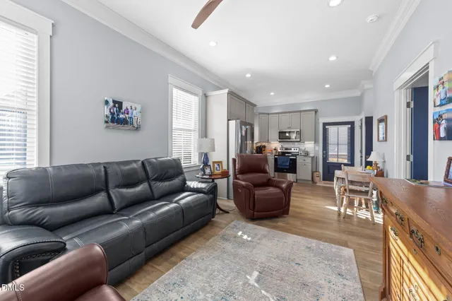 a view of a house with outdoor space and sitting area