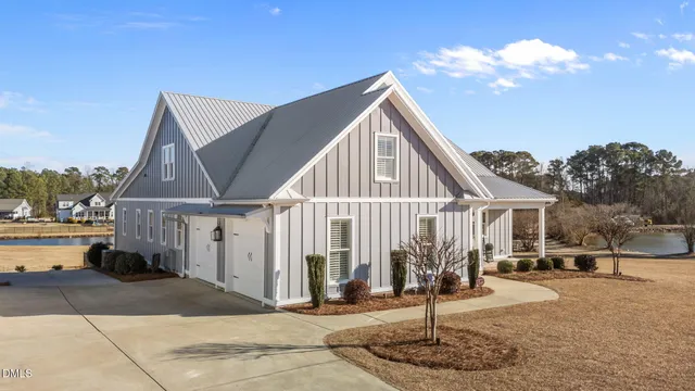 an aerial view of a house with swimming pool