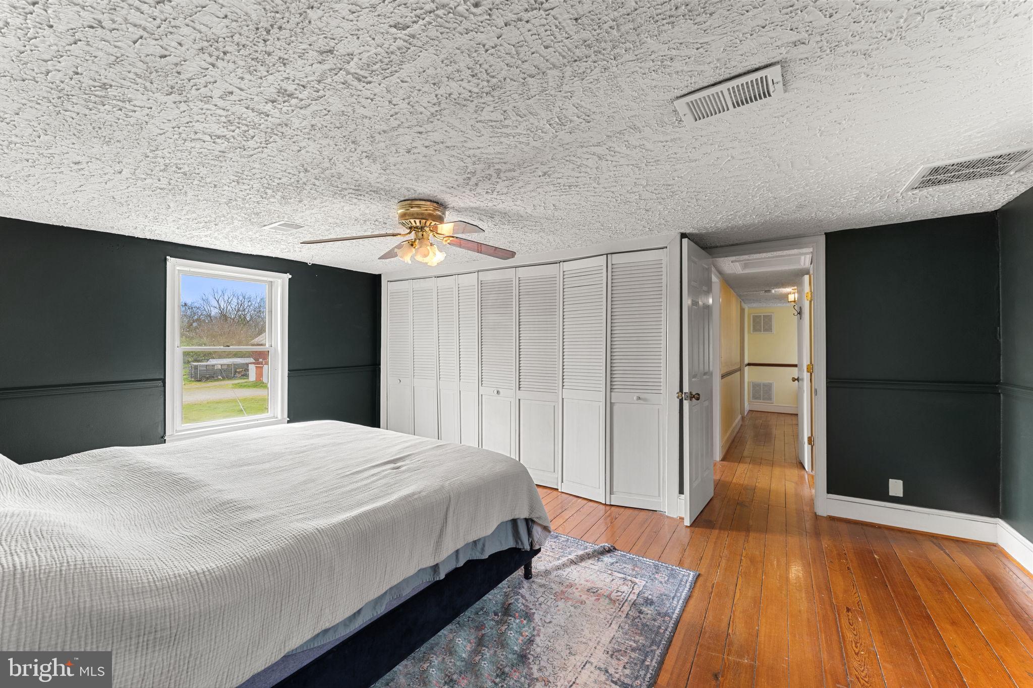 420 Russell Road Berryville, VA 22611 - Photo 39 of 60 Serene bedroom with ample storage.
