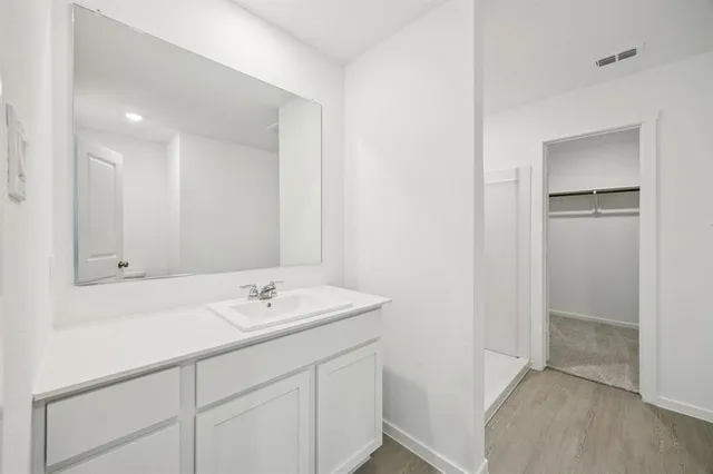 a bathroom with a sink a toilet and a bathtub