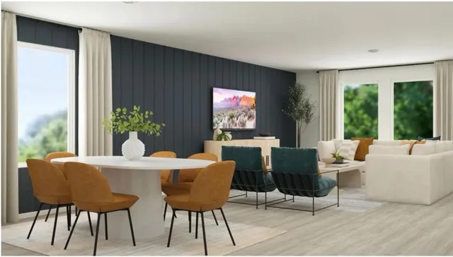a view of a dining room with furniture window and outside view