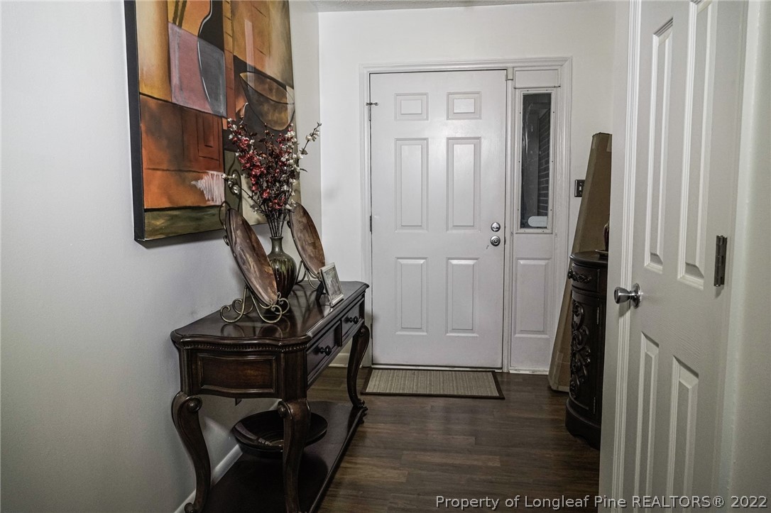 720 Riyhad Road Fayetteville, NC 28314 - Photo 5 of 22 a view of a hallway with wooden floor