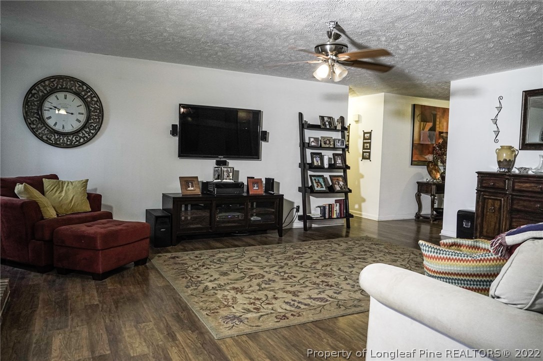 720 Riyhad Road Fayetteville, NC 28314 - Photo 7 of 22 a living room with furniture and a flat screen tv