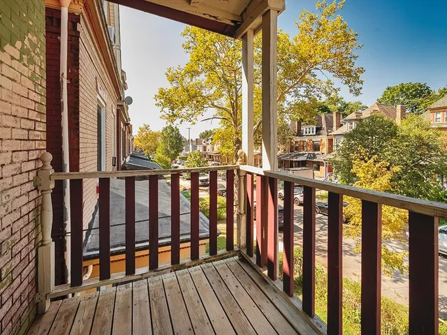 a view of city from a balcony