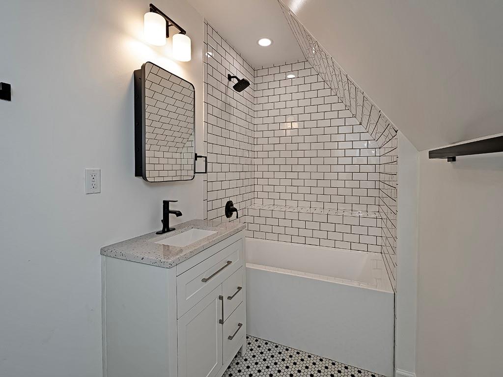 628 North Euclid Avenue, Unit 2 Pittsburgh, PA 15206 - Photo 22 of 27 a bathroom with a shower toilet and sink