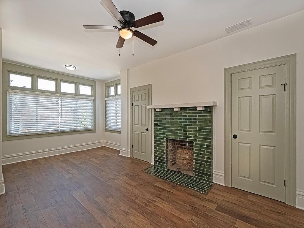 628 North Euclid Avenue, Unit 2 Pittsburgh, PA 15206 - Photo 5 of 27 a view of an empty room with wooden floor and a window