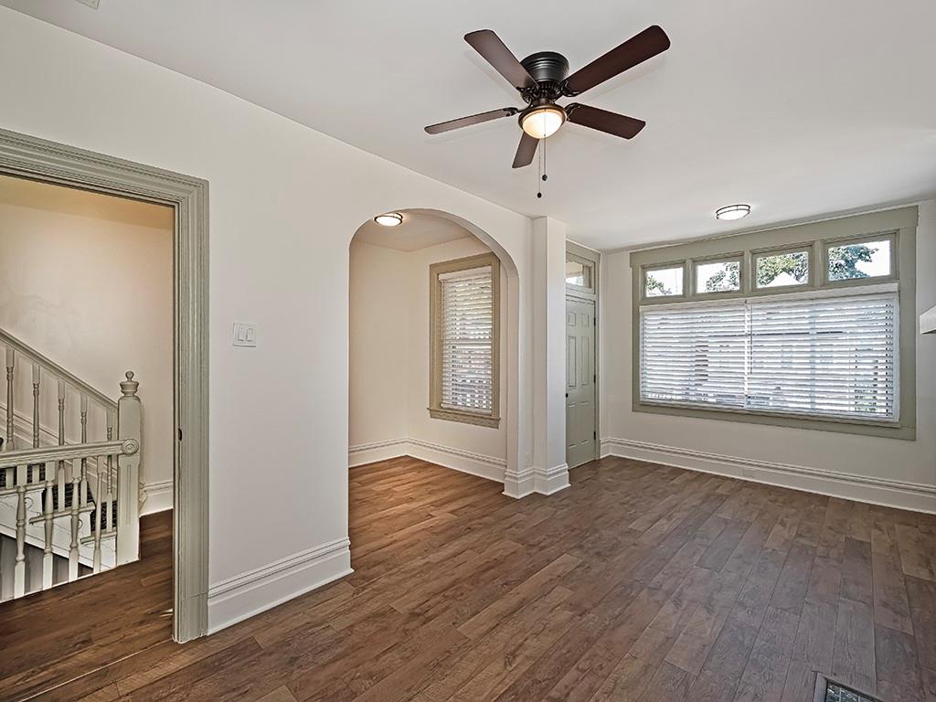 628 North Euclid Avenue, Unit 2 Pittsburgh, PA 15206 - Photo 6 of 27 wooden floor in an empty room with a window