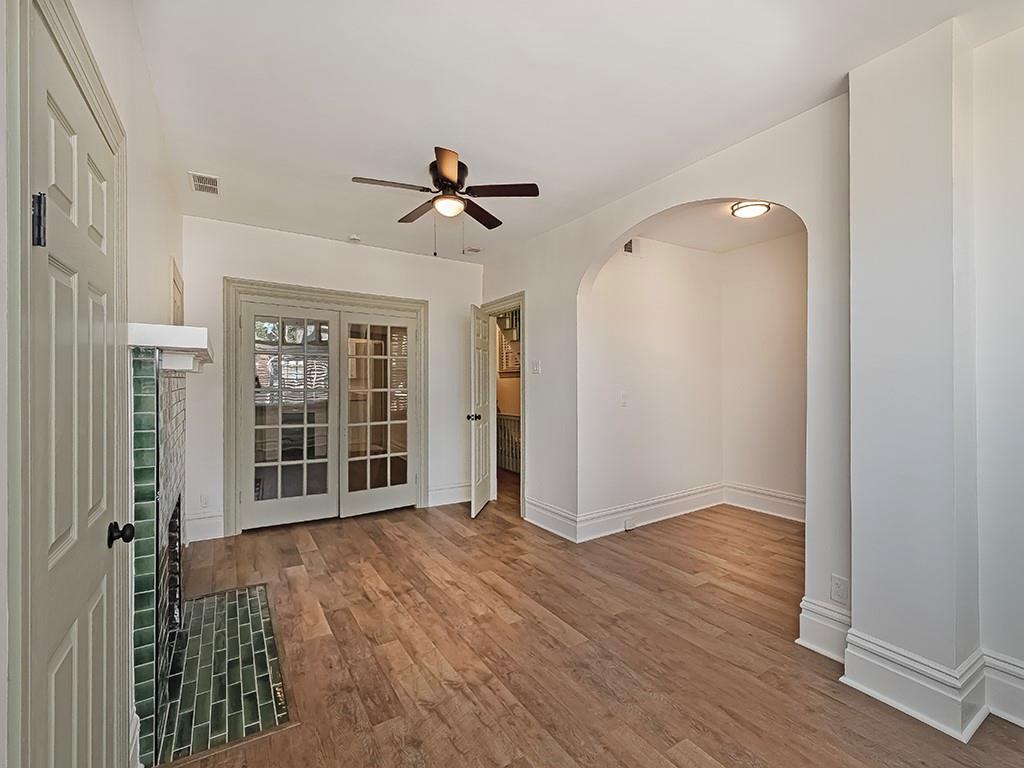 628 North Euclid Avenue, Unit 2 Pittsburgh, PA 15206 - Photo 8 of 27 wooden floor in an empty room with a window