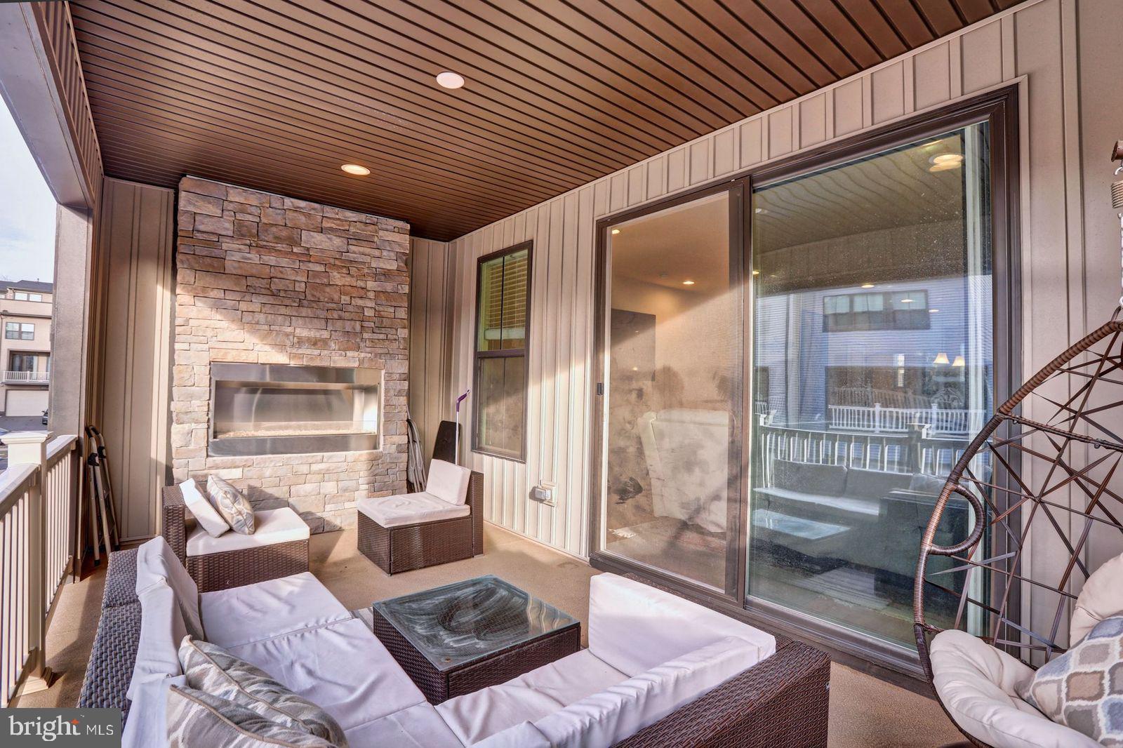 43397 Charitable Street Ashburn, VA 20148 - Photo 11 of 25 Covered Balcony with Cozy Fireplace!