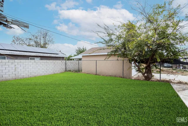 a view of a backyard with a garden