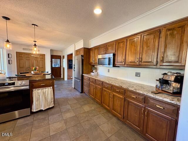 625 McCray Road Burlington, NC 27217 - Photo 11 of 38 a large kitchen with stainless steel appliances granite countertop a stove sink and cabinets