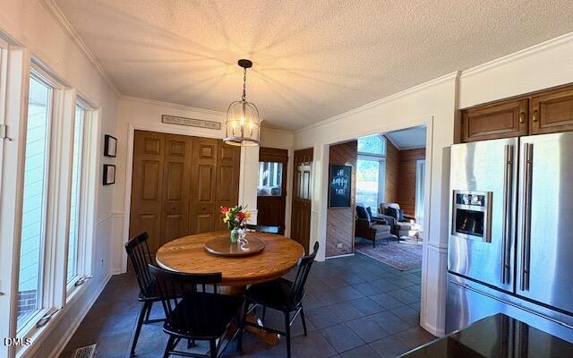 625 McCray Road Burlington, NC 27217 - Photo 12 of 38 a view of a dining room with furniture window and wooden floor