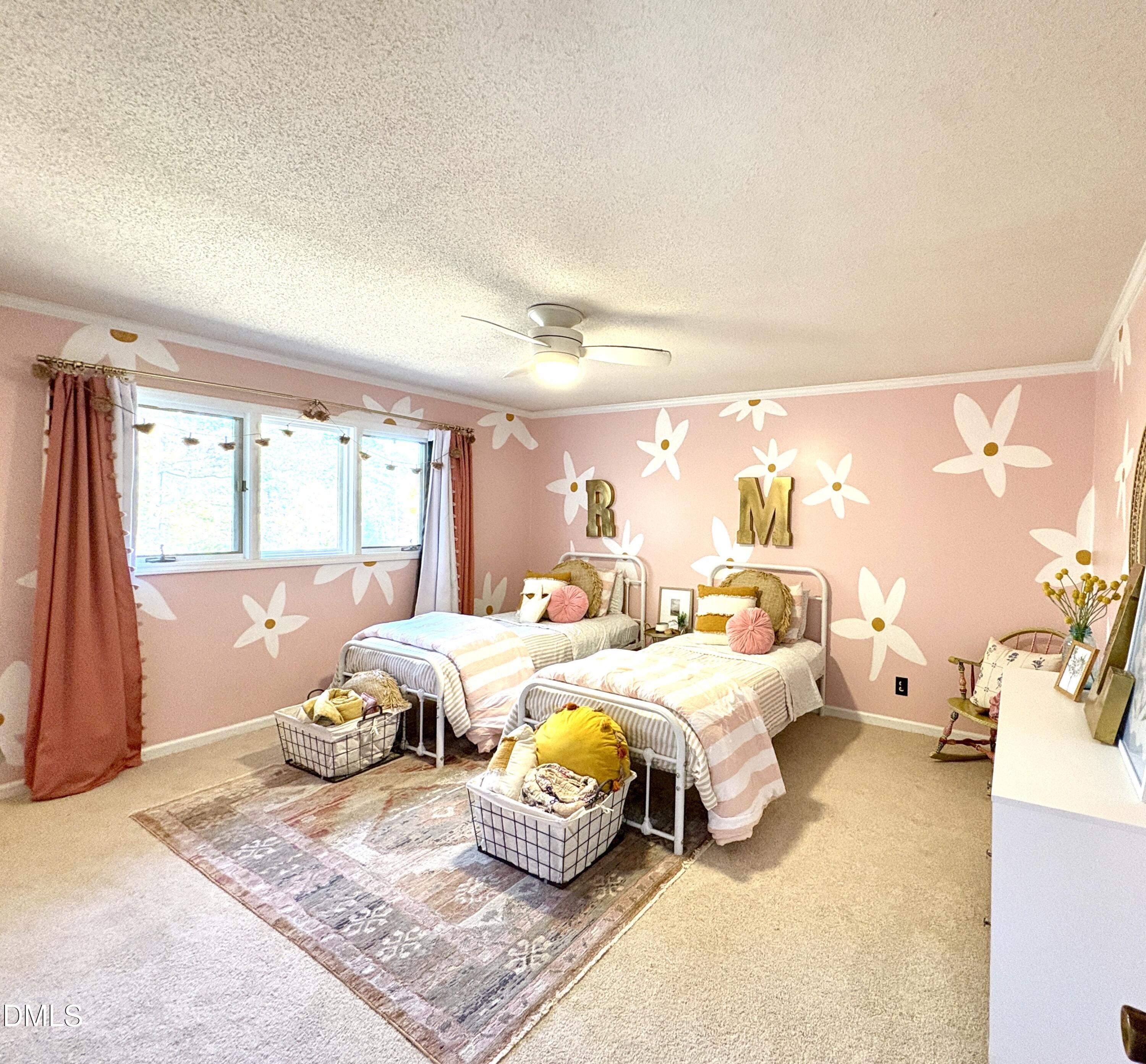 625 McCray Road Burlington, NC 27217 - Photo 22 of 38 a bedroom with furniture and a window