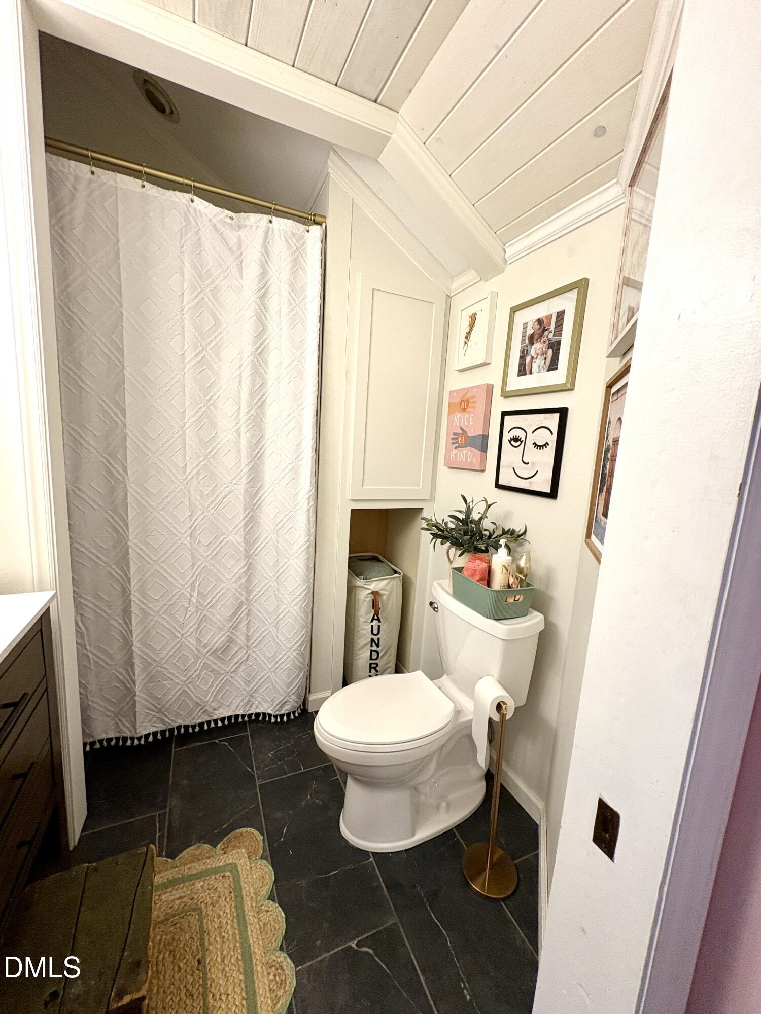 625 McCray Road Burlington, NC 27217 - Photo 25 of 38 a bathroom with a sink toilet and shower