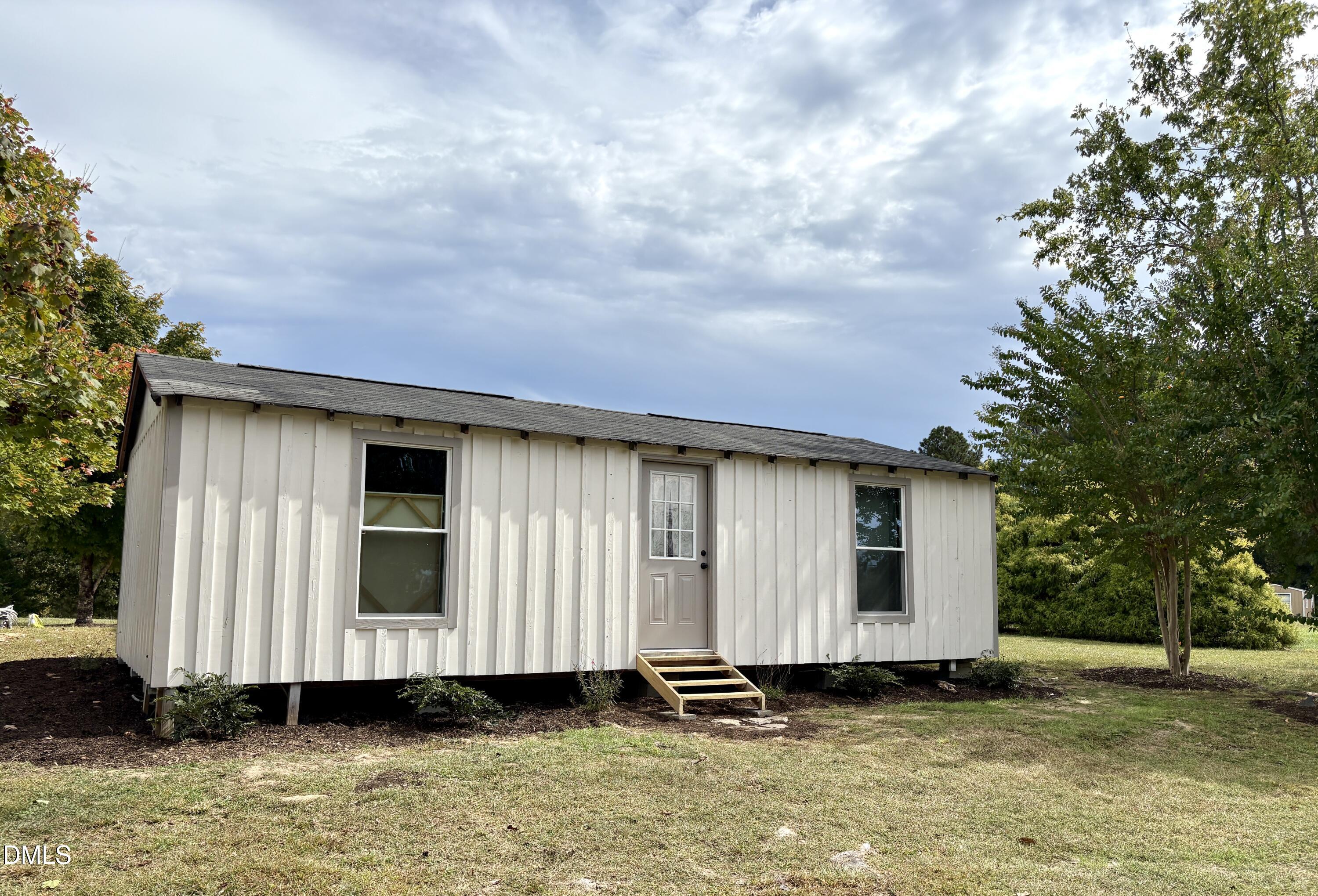 625 McCray Road Burlington, NC 27217 - Photo 33 of 38 a front view of a house with a yard