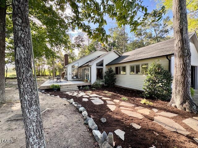 625 McCray Road Burlington, NC 27217 - Photo 4 of 38 a view of a house with a tree in the yard