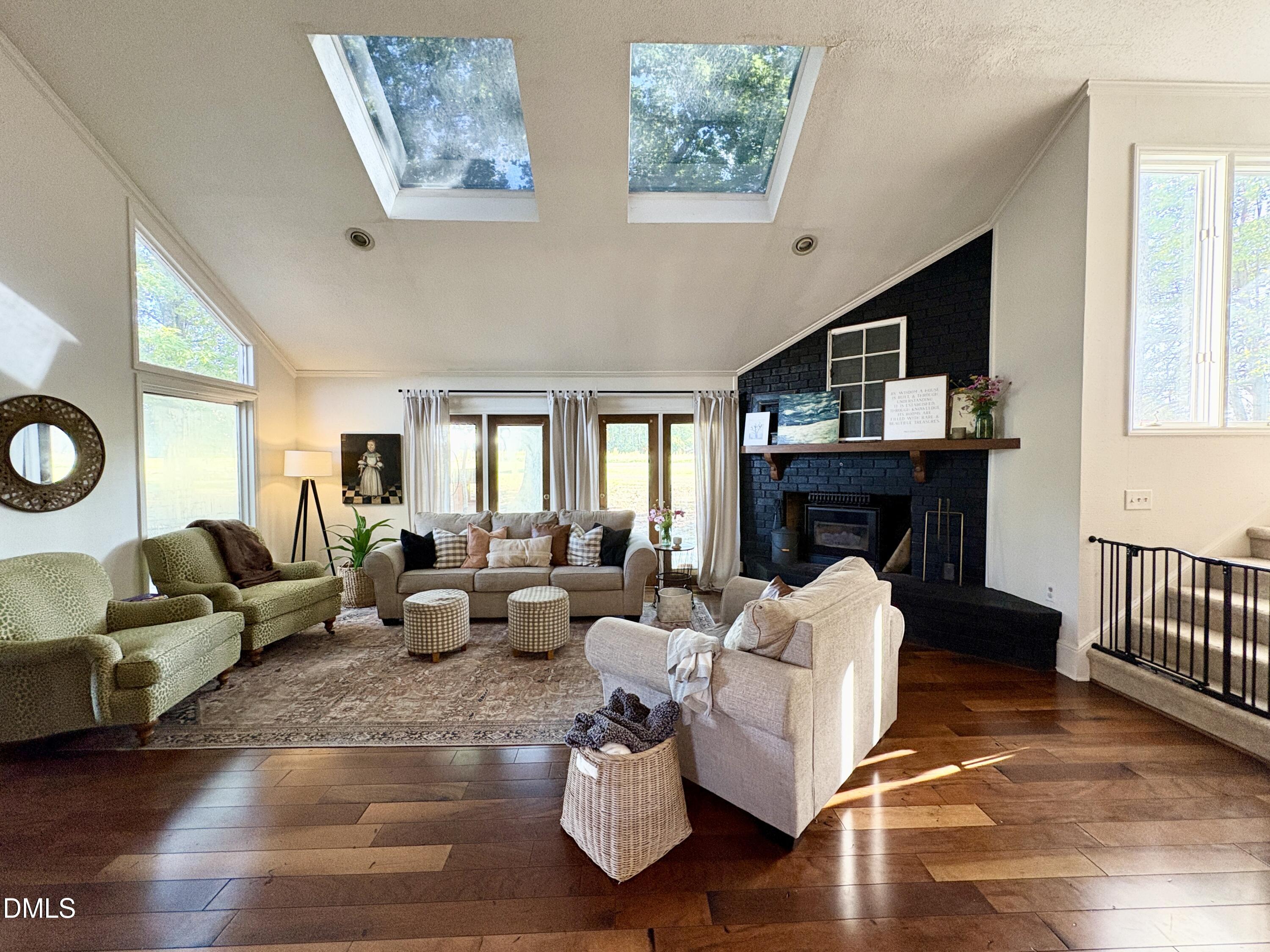 625 McCray Road Burlington, NC 27217 - Photo 7 of 38 a living room with furniture and a fireplace