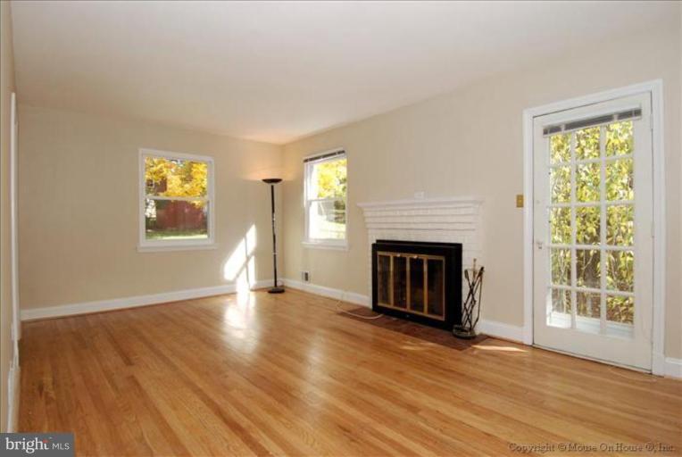 2709 Arcola Avenue Silver Spring, MD 20902 - Photo 3 of 22 Notice the cozy fireplace!